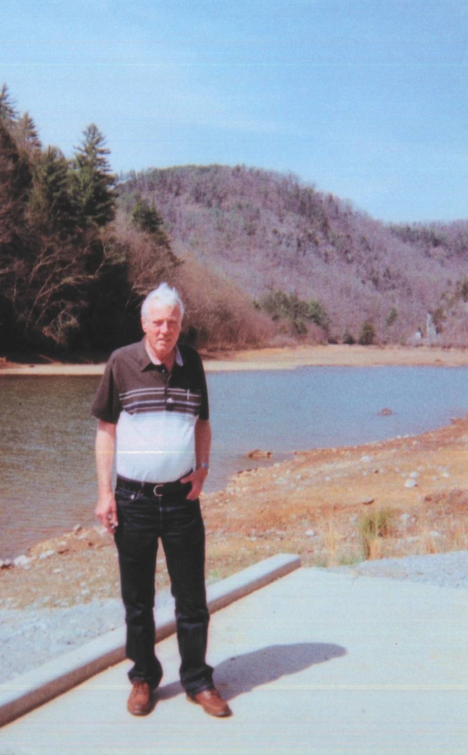 Robert Lee Bell Sr. beside a lake, 1990s