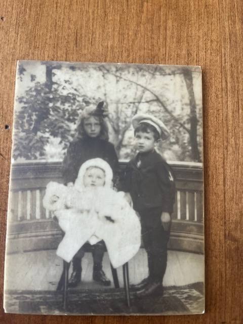 Alan Frost as a baby with his older sister and brother, about 1903–04