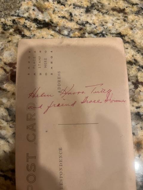 The back of the postcard, naming both girls